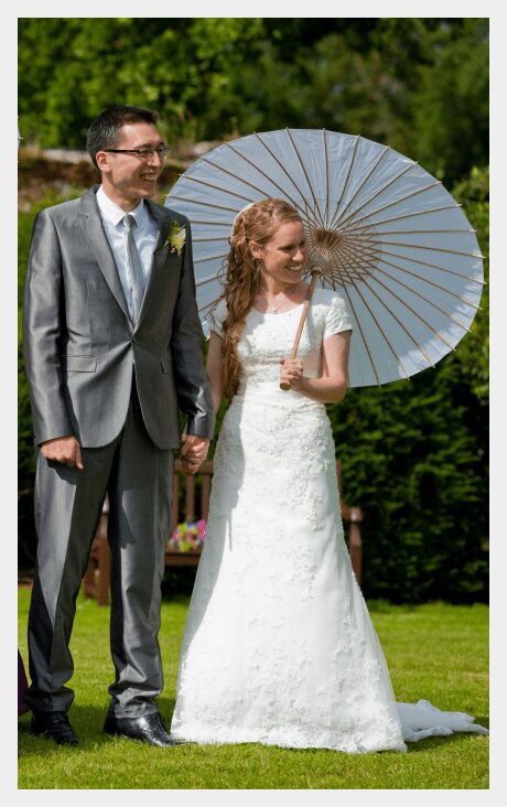 Wedding dress by Felicity Westmacott, Modest ivory lace and satin wedding dress