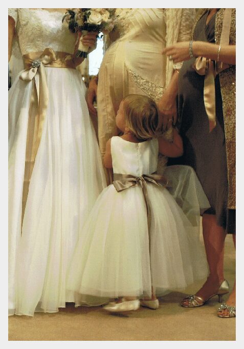 Flower girl dresses by Felicity Westmacott, ivory duchess satin and soft tulle with coffee ribbon sashes