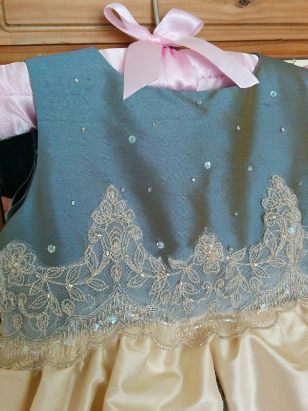 Mini-me Christening Dress in pale gold and blue silk with lace by Felicity Westmacott: lace applique detail