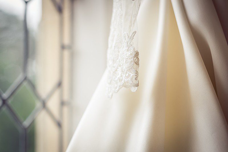 corded lace sleeve detail on custom wedding gown