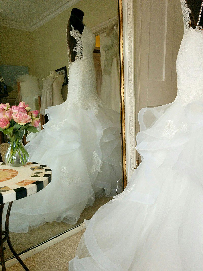 custom wedding gown backless illusion frill in the mirror