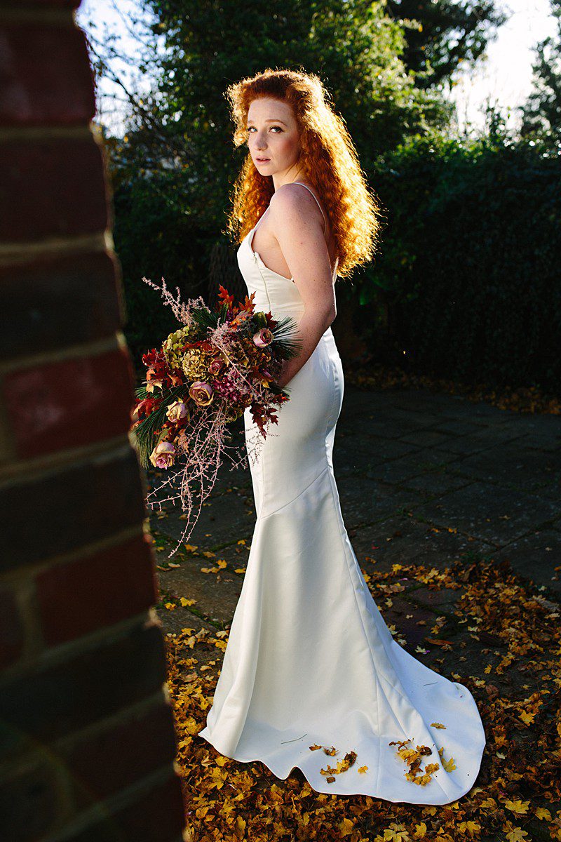 custom wedding gown with train, low back and straps