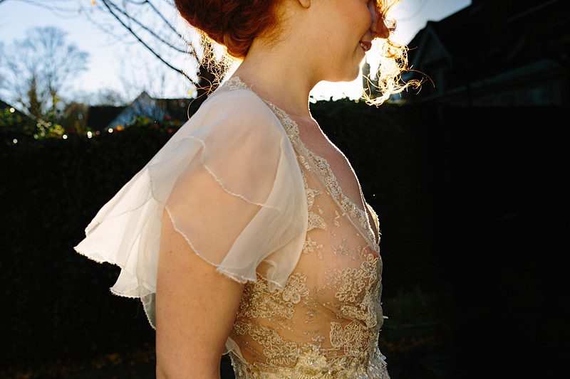 flutter waterfall sleeve modest wedding gown