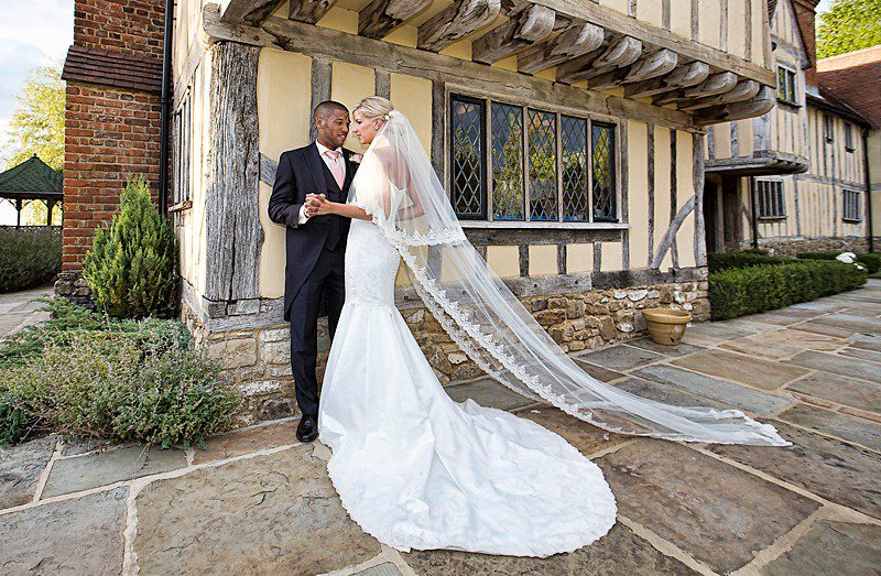 Wedding dress with train and clearance veil