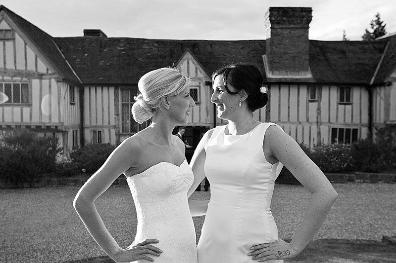 gay pink wedding brides sisters ivory wedding dresses by felicity westmacott