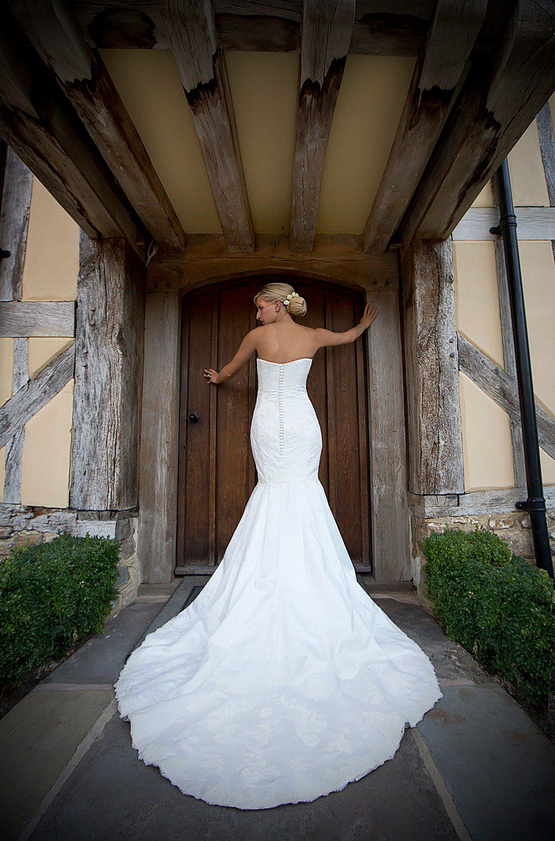 fitted strapless wedding dress with cathedral petal train bespoke