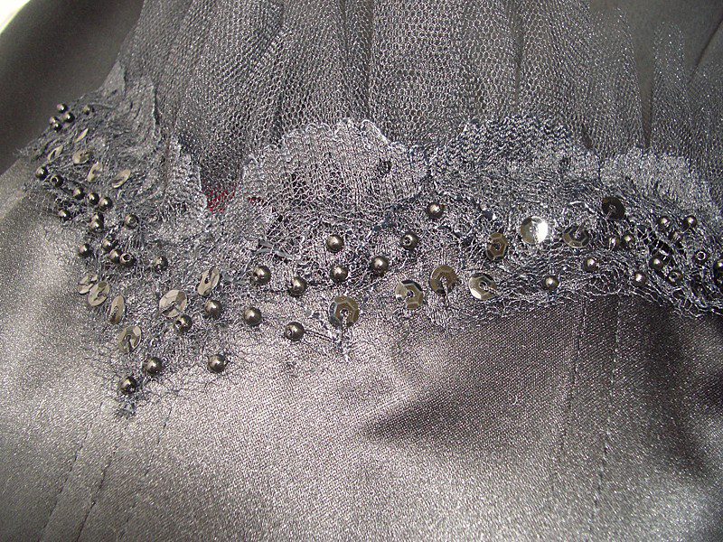 faye 20 hand sewn beaded lace and tulle trim to sweetheart neckline and boning channels