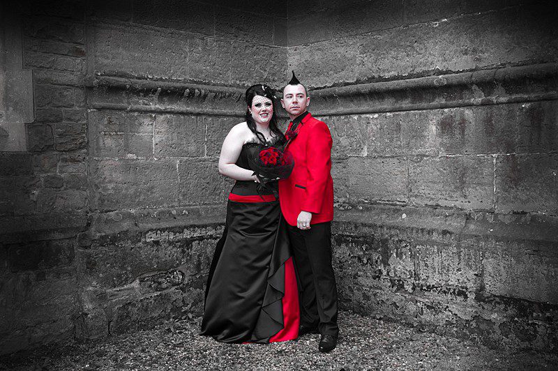 faye 6 plus size goth bride with punk groom in black wedding dress church