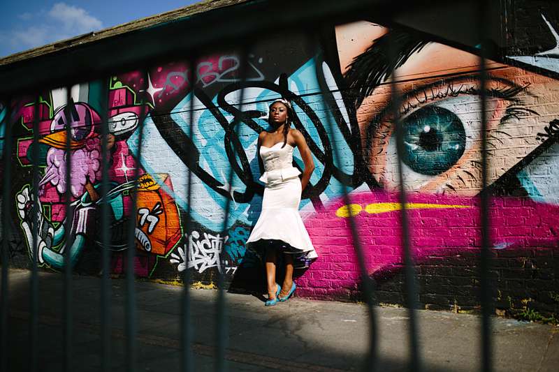 brick lace photoshoot wedding dress graffiti alternative