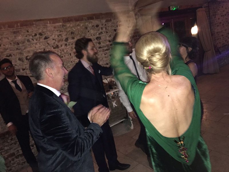 mother of the bride dancing the night away in cowl back dress made to order green silk velvet and chiffon