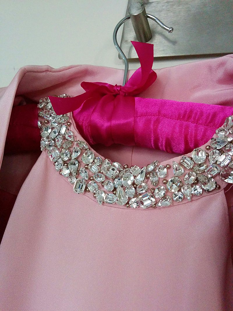 beaded detail to neckline of pink occasionwear dress