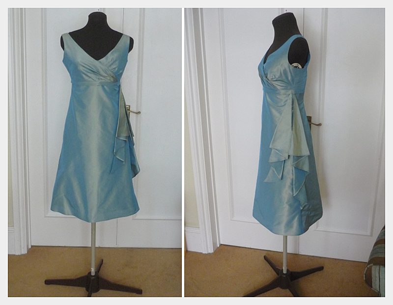 finished dress on the stand ruched bodice with straps and waterfall sash