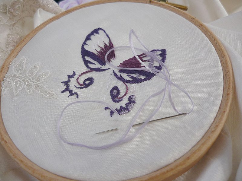 work in the embroidery hoop silk butterfly detail