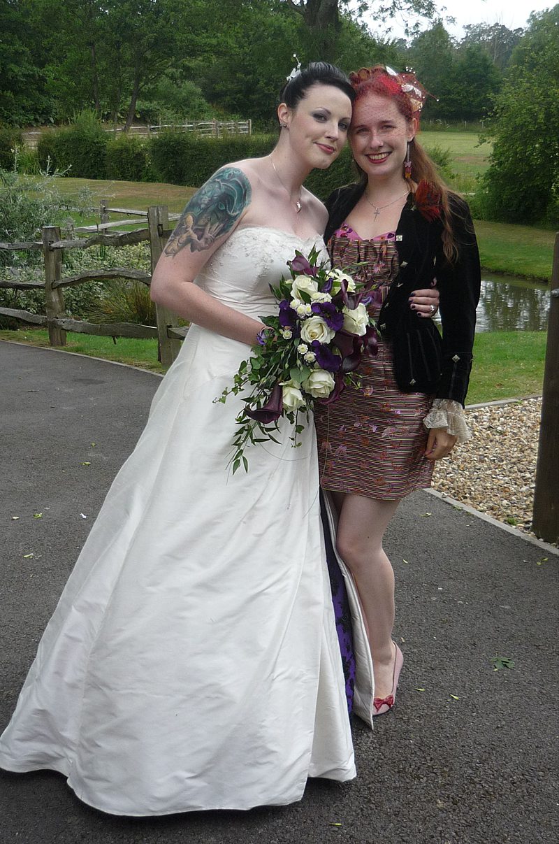 alternative tattoo bride with her dressmaker