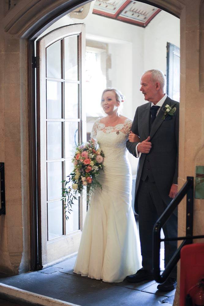 bride arriving at ceremony fit and flare skirt