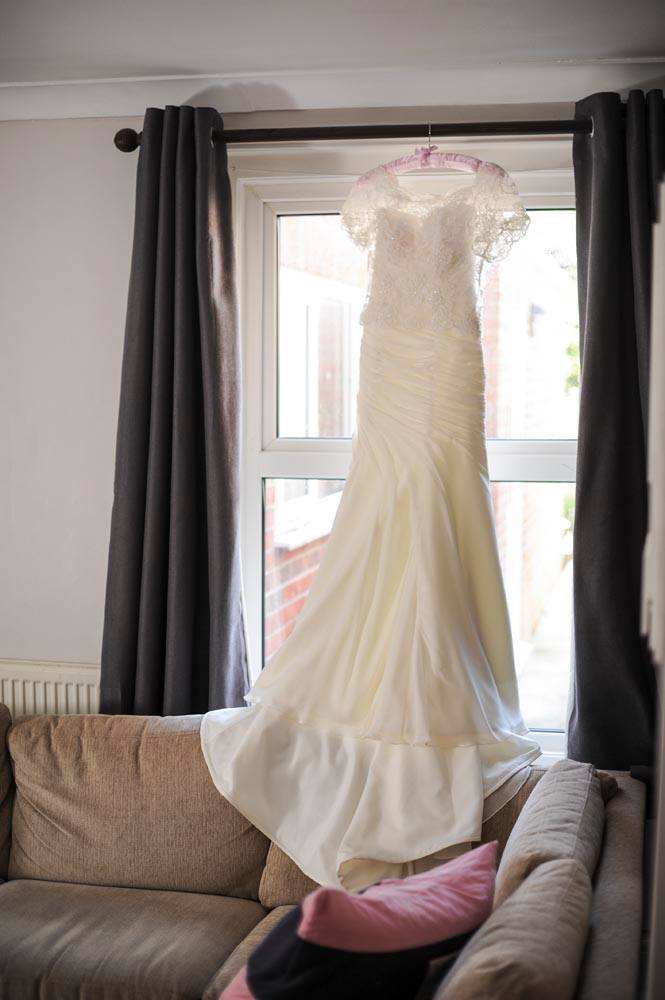 dress hanging in window simple