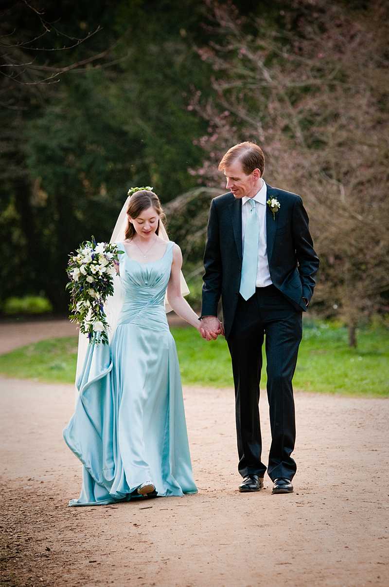 walking with her groom bespoke silk tie to match the bride