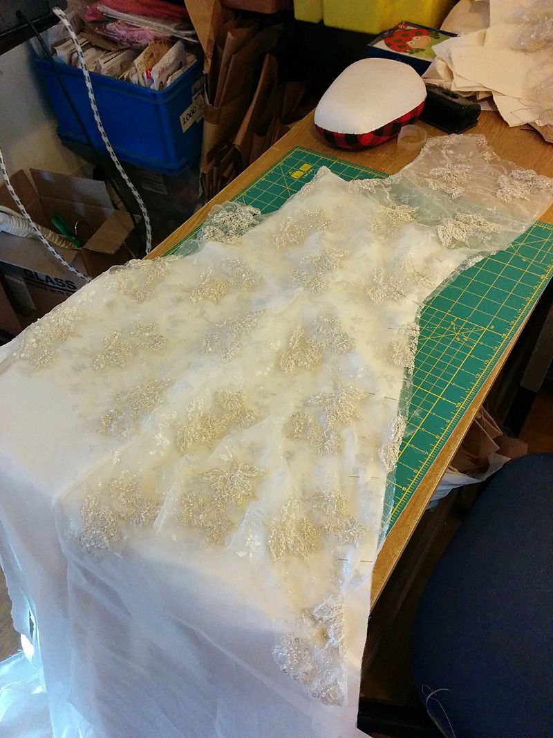making a wedding dress sewing room picture