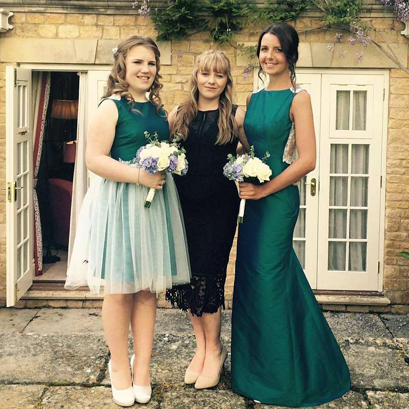 mix and match bridesmaids styles in teal silk and ivory tulle