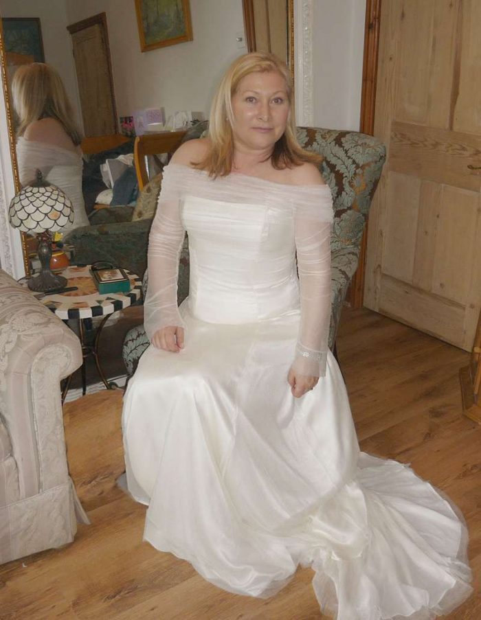 finished wedding dress fitting room ivory silk
