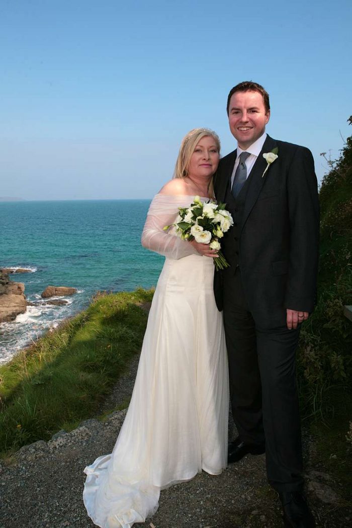 ivory silk and tulle wedding dress by the sea