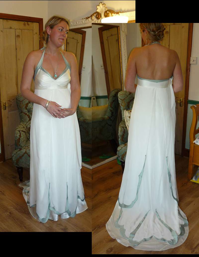 fitting picture bespoke wedding dress with blue trim
