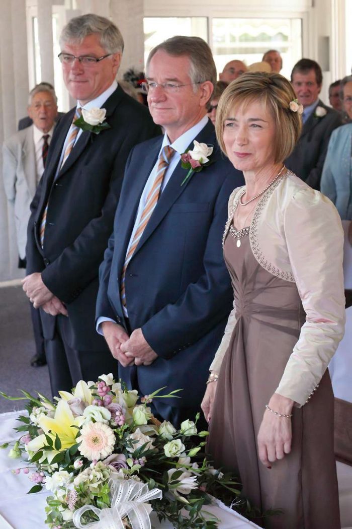 ruched front brown wedding dress with long sleeves