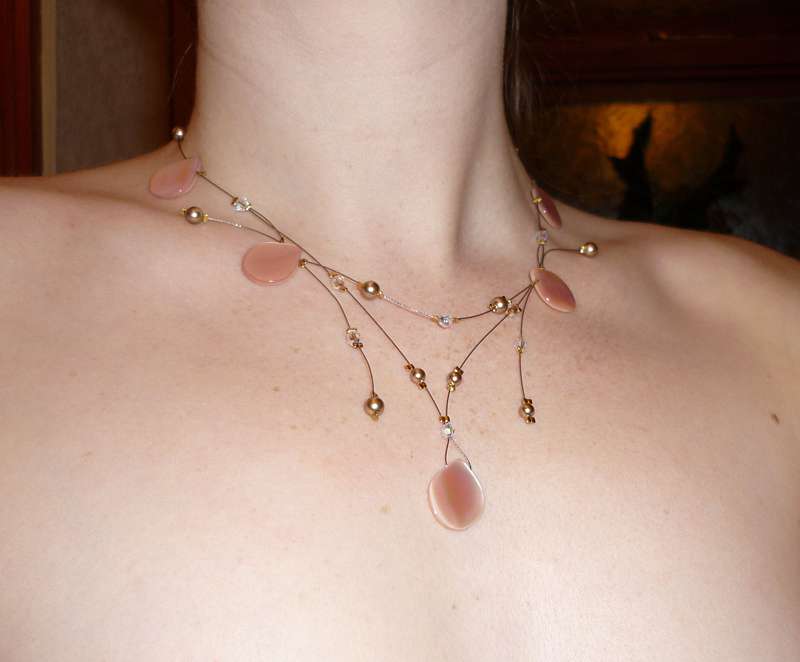 floating mother of pearl petal and bronze necklace