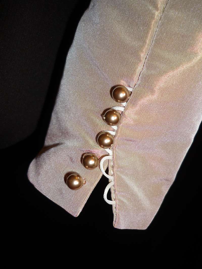 button cuff detail on bespoke bolero