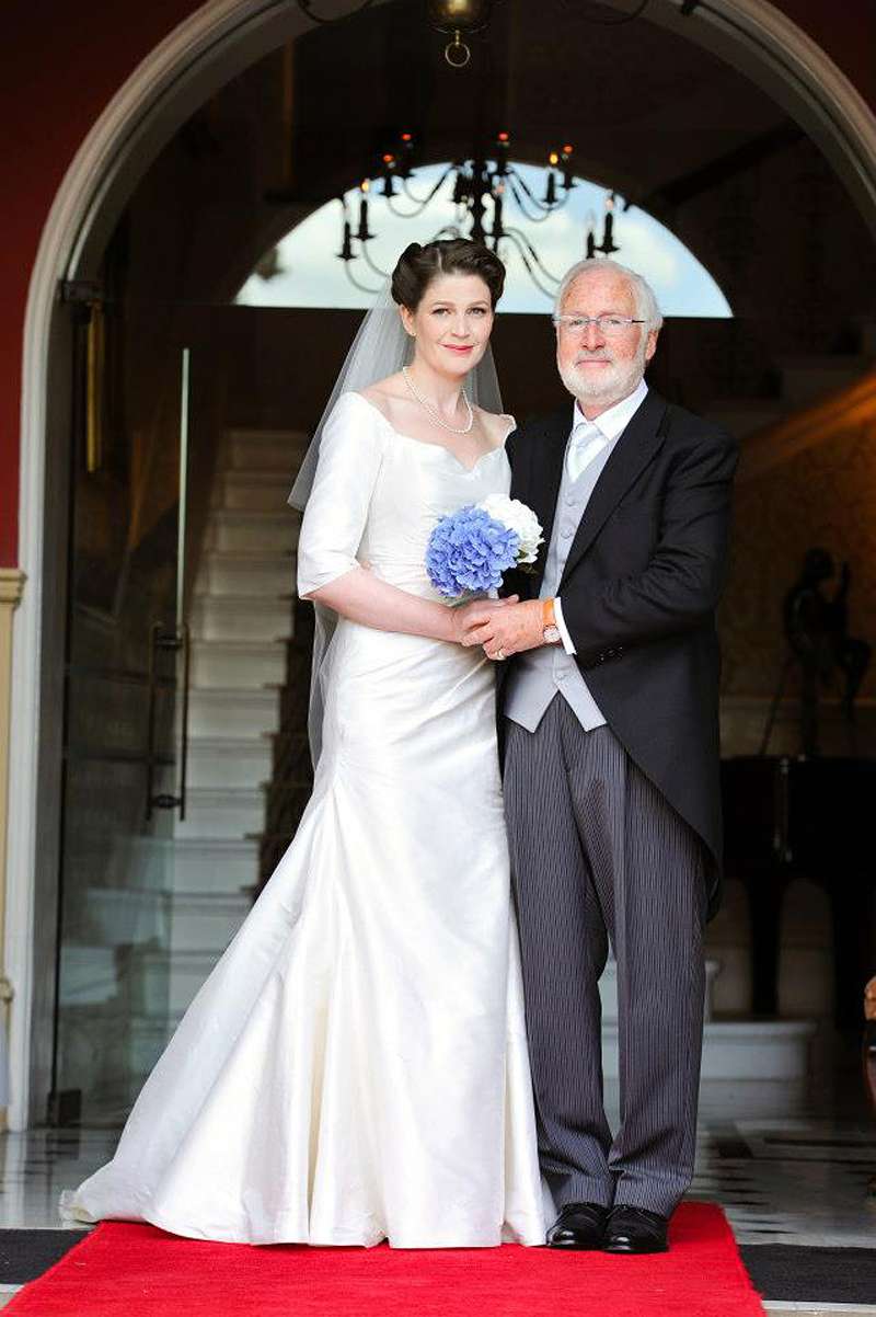 bride and her father church wedding traditional dress