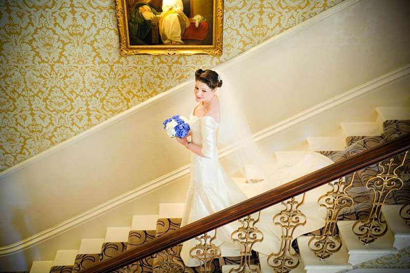 bride on the staircase traditional ivory silk dress