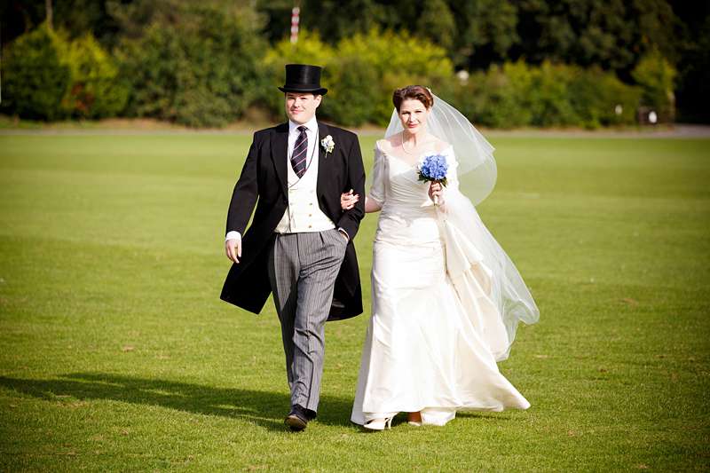 top hat and morning coat groom ivory silk wedding dress english summer