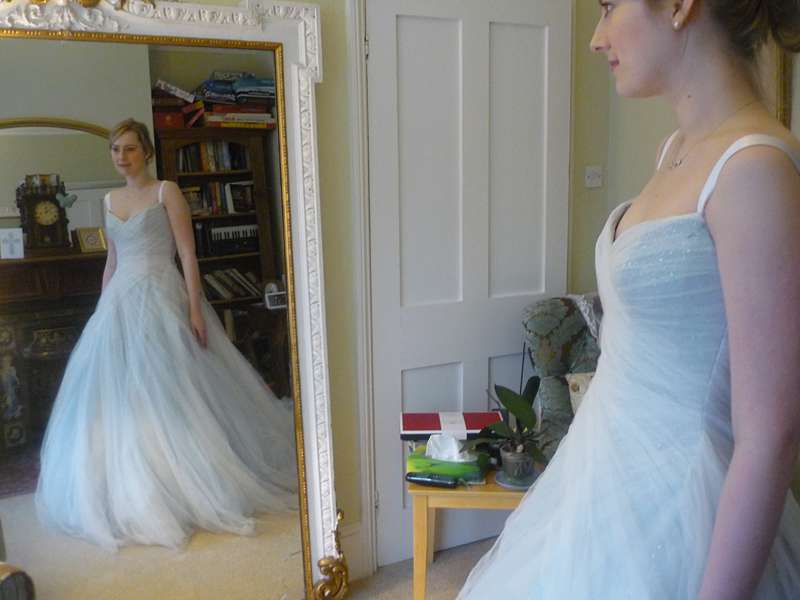 fitting picture bride in the mirror blue dress