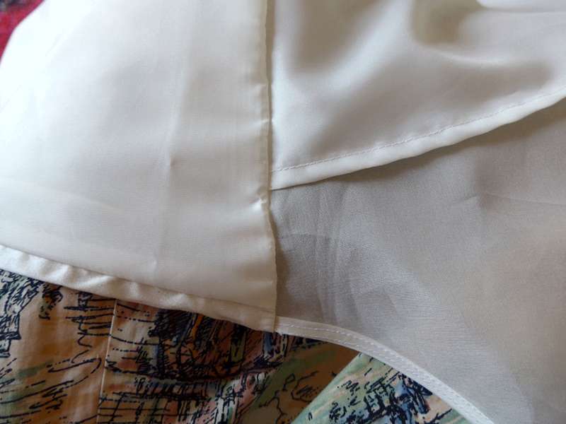 construction details on couture bespoke wedding dress silk organza roll hem