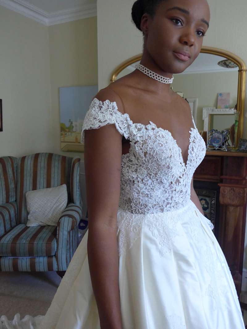 final fitting in finished dress black bride