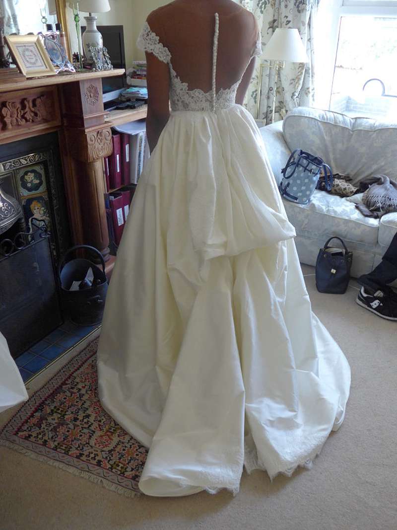 bespoke wedding dress fitting picture bustle train
