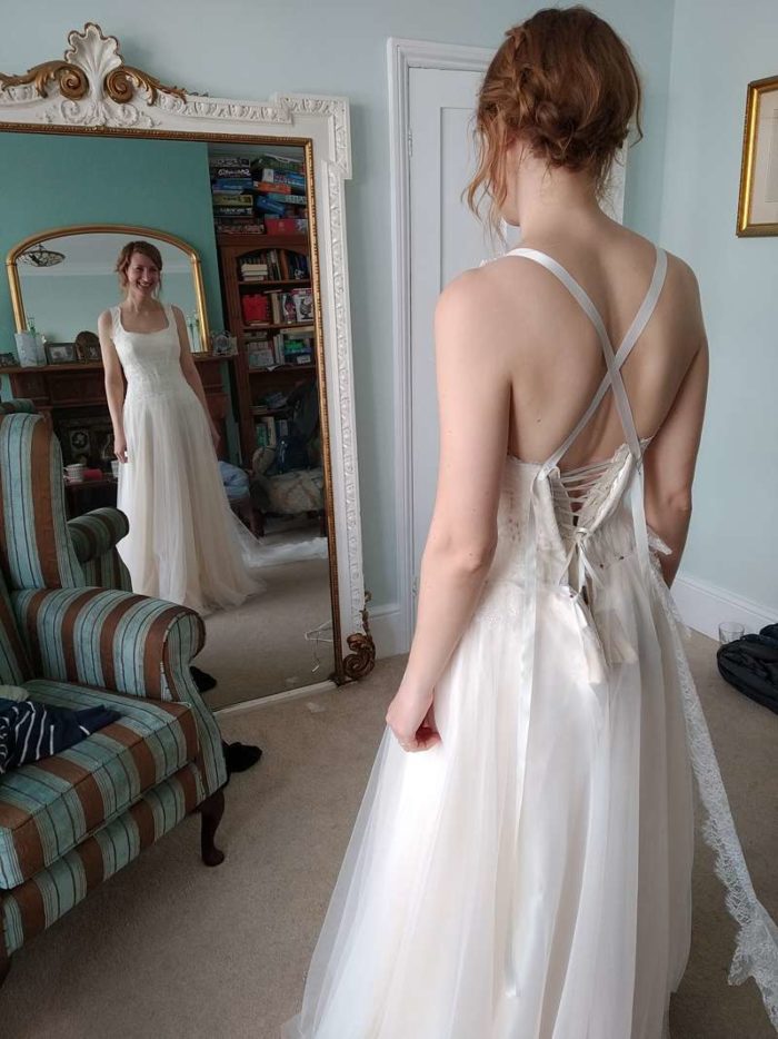 bride in mirror fitting made to measure