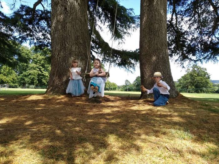 garden wedding children on swings cadhay house devon