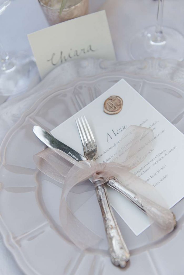 rustic cutlery and crockery tied with organza ribbon