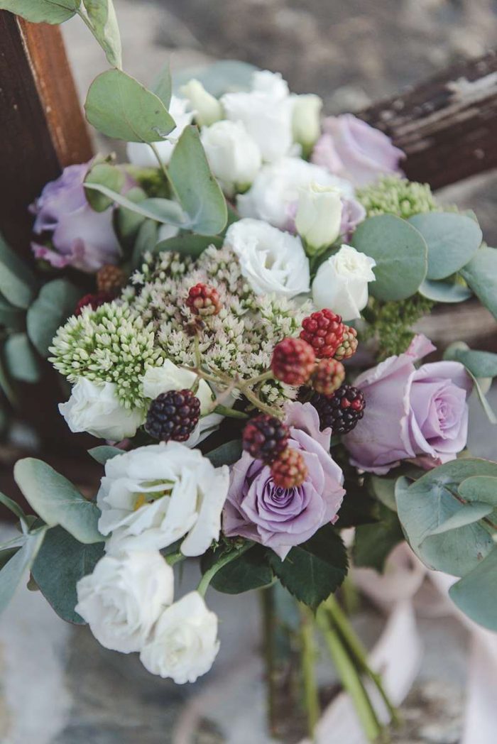 rustic wedding bouquet with roses, alium, eucalyptus and blackberries