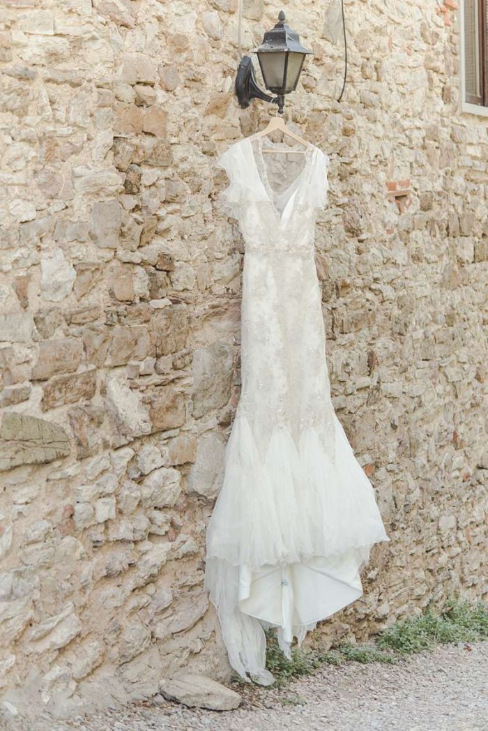 bespoke wedding dress hanging up before wedding