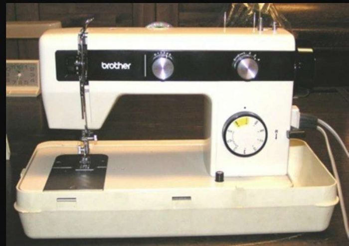 an older Brother sewing machine with vintage controls
