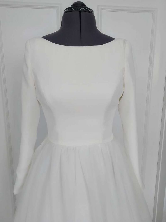 bridal shrug top on the stand