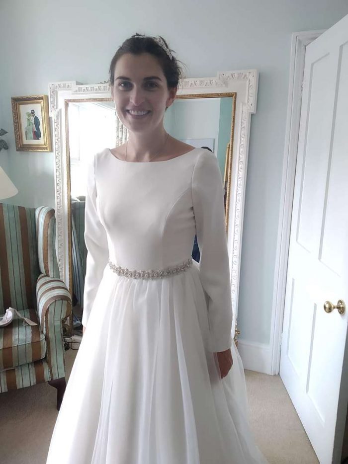 happy bride at final fitting bespoke bridal