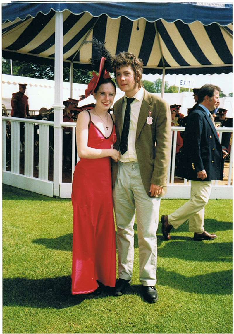 Felicity and husband at the henley royal regatta in a bespoke red dress