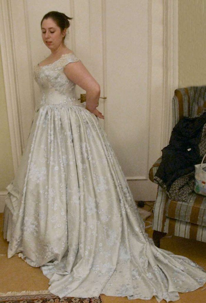 victorian wedding dress with train fitting picture