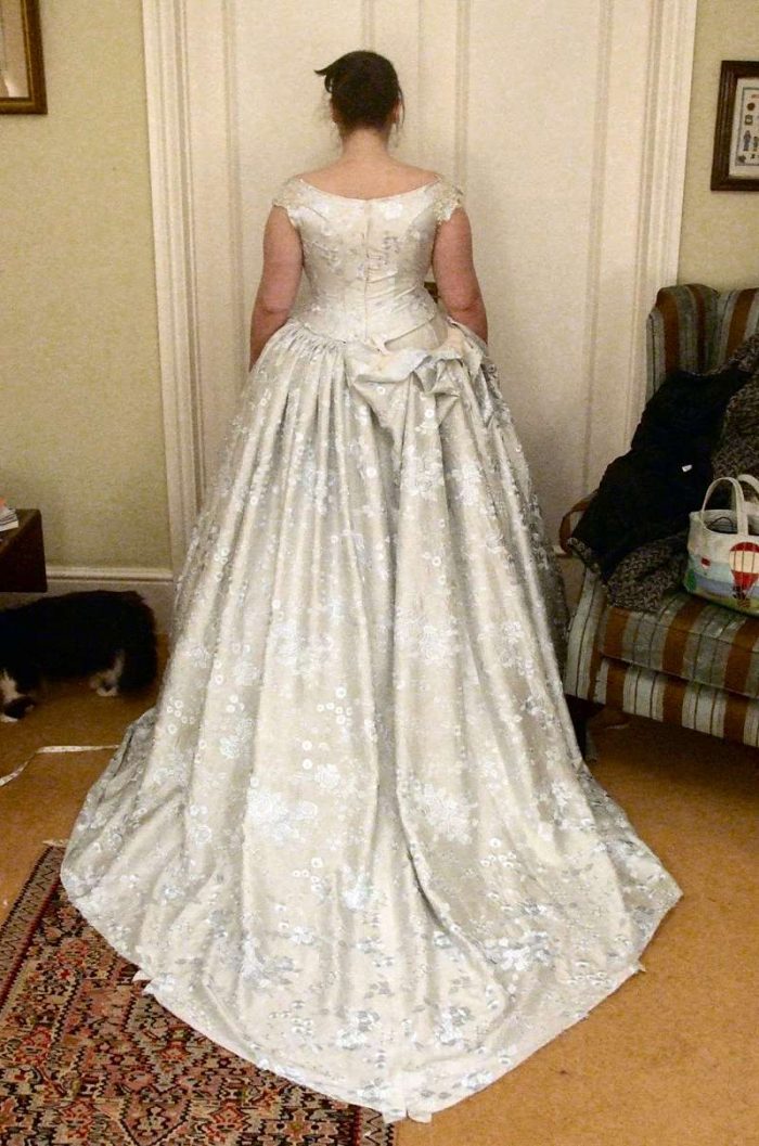bespoke wedding dress fitting with train making process