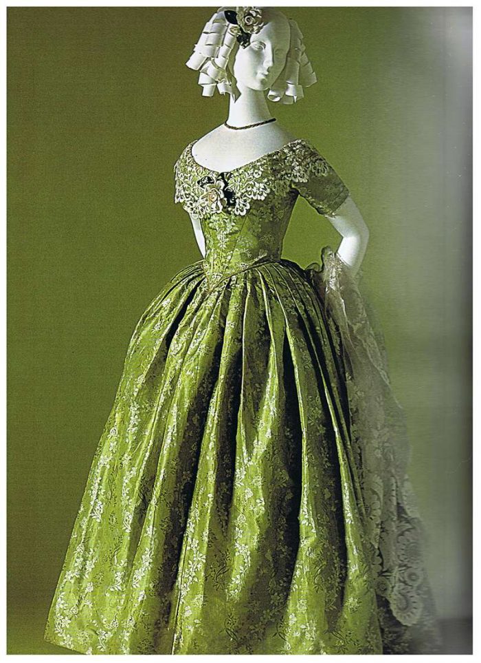 green victorian dress with pleated skirt inspiration image
