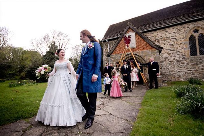 church wedding with period inspired design for bride and groom