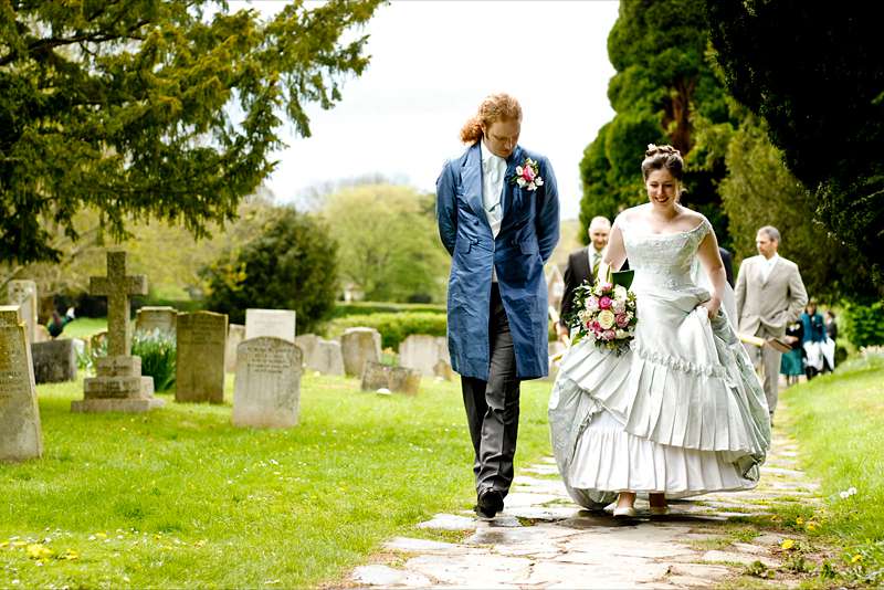 pleated frill victorian wedding dress on church path